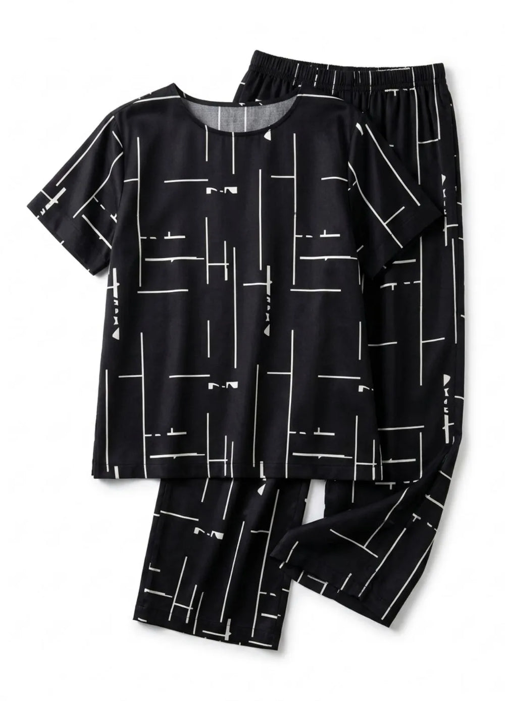 Black and white patterned pajama set on a white background
