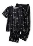Black and white patterned pajama set on a white background