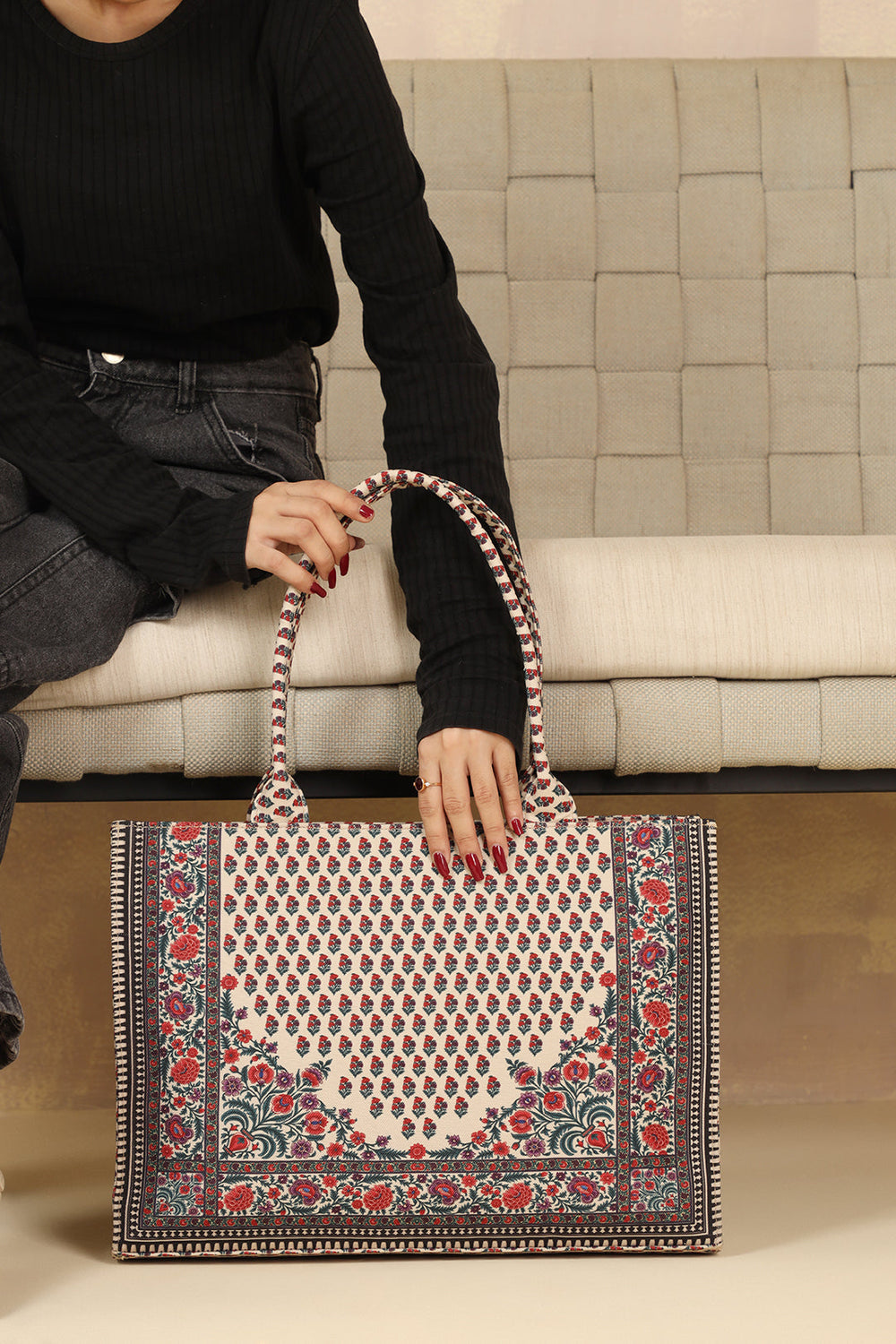 Close-up of red and teal chintamani boota print on WestStyle Chatai canvas tote designer canvas handbag Pakistan