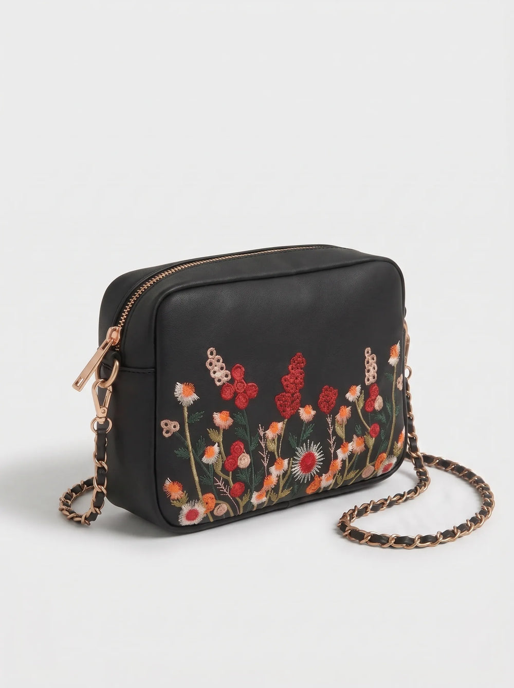 WestStyle Chic Crossbody black side view showing leather-woven rose-gold chain and smooth black back panel crossbody bag for girls Pakistan