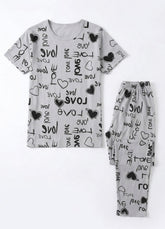 Gray pajama set with 'love' and heart patterns on a white background