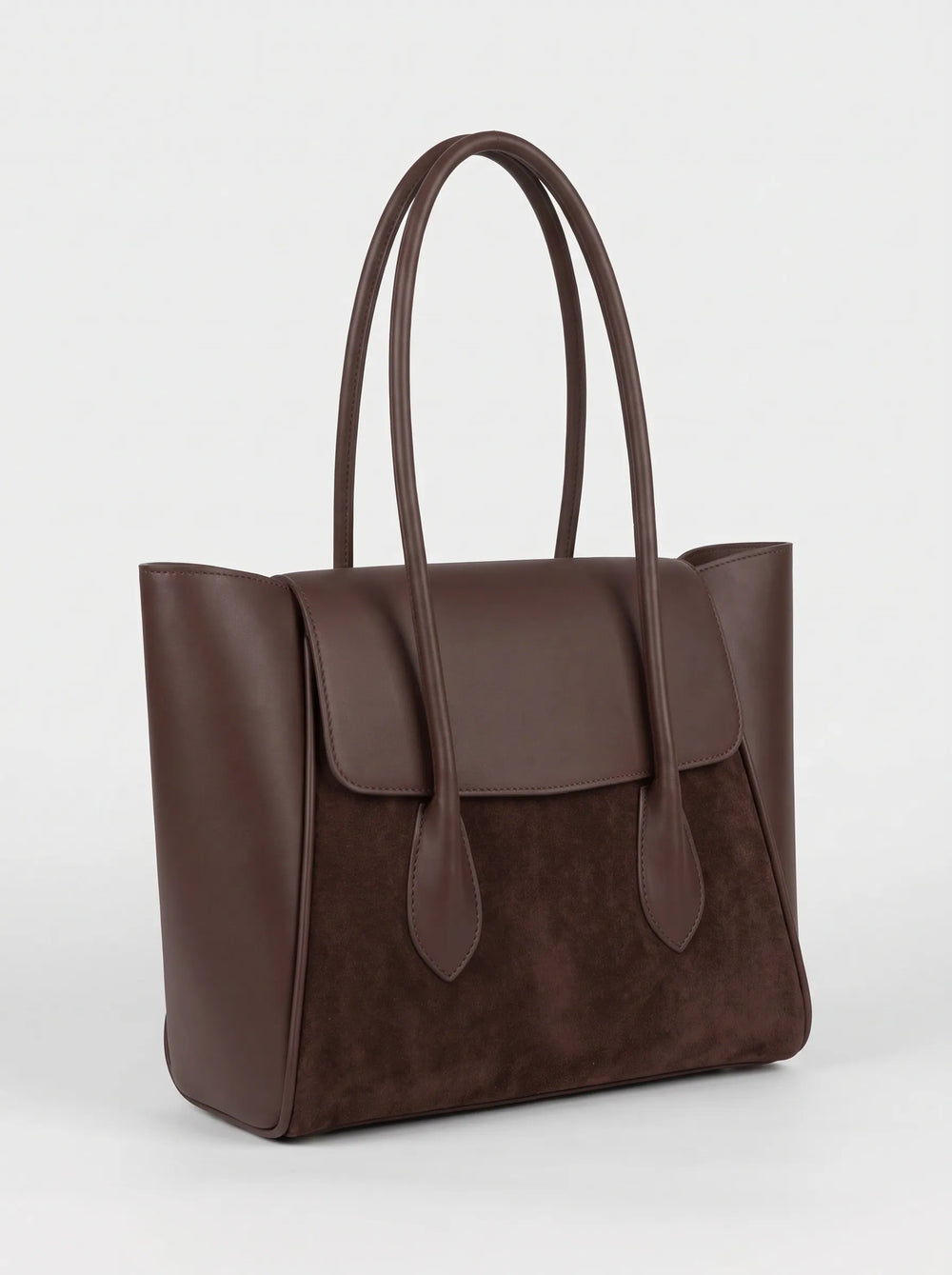 WestStyle Pyraflip brown structured tote showing wing silhouette, suede front panel and loop handles premium tote bag Pakistan