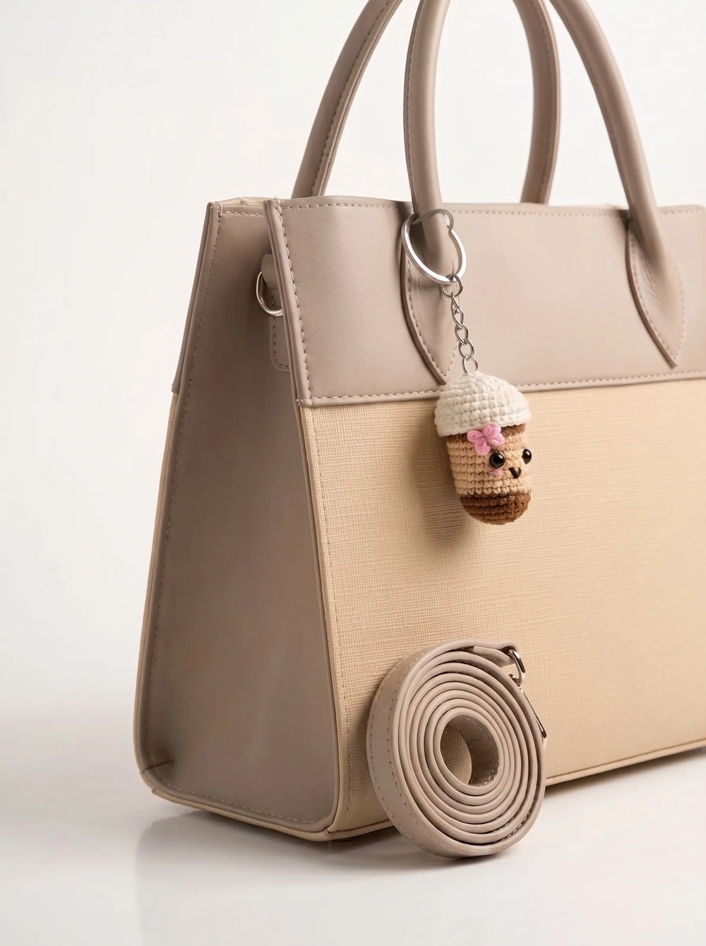 Close-up of Saffiano crosshatch cream body and smooth taupe upper panel on WestStyle beige structured shoulder bag ladies bag Pakistan