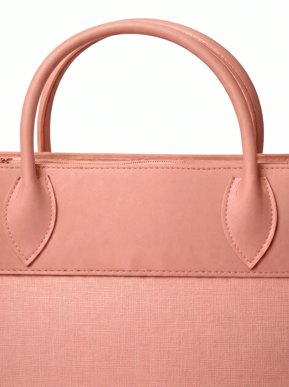 Close-up of dual-tone Saffiano texture and rounded handles on WestStyle peach ladies shoulder bag Pakistan