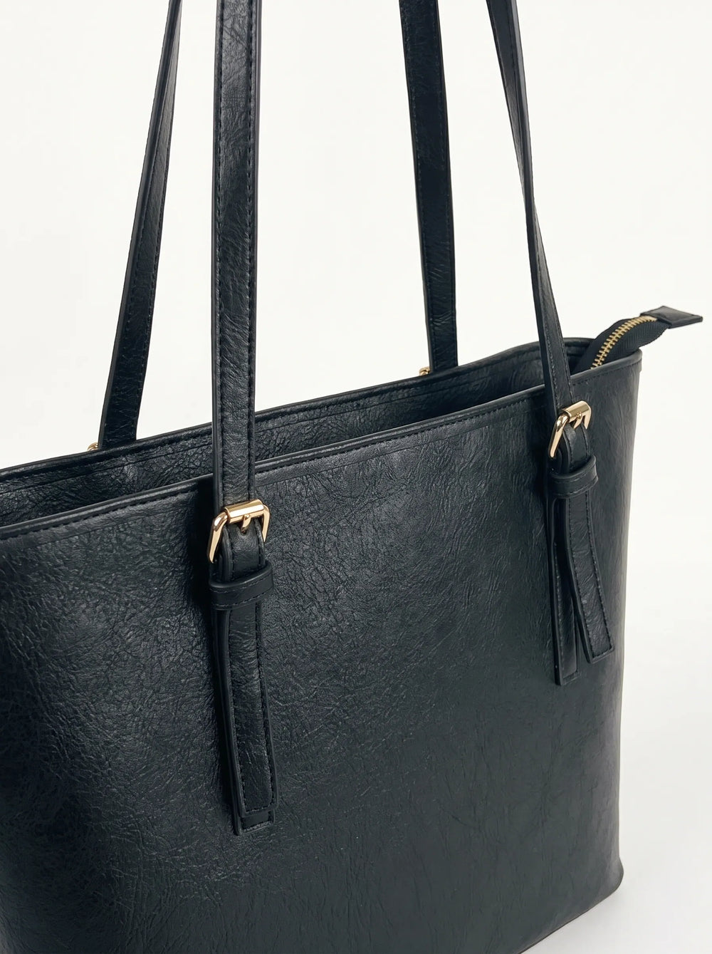 Gold buckle handle hardware on WestStyle Buckle Tote black structured ladies handbag Pakistan