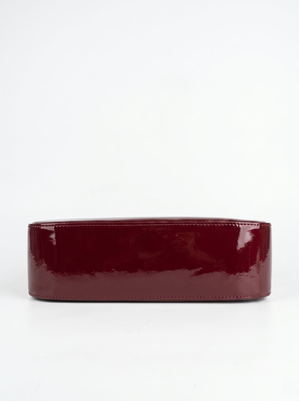 Single arched glossy patent loop handle on WestStyle Shine Cherry maroon baguette bag stylish shoulder bag for women Pakistan