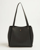 Large black smooth PU leather shoulder tote bag with gold rivet detail and long flat handles minimal black handbag online Pakistan by WestStyle