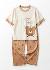 Children's pajama set with bear design on a white background
