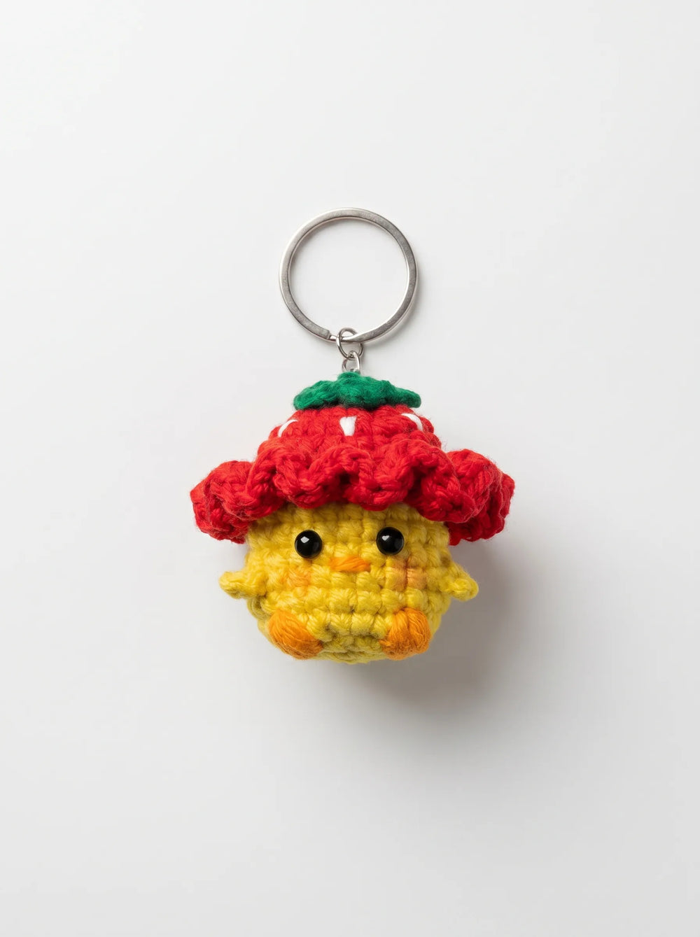 Handmade kawaii baby chick crochet keychain wearing a red strawberry hat - cute bag charm for girls by WestStyle Pakistan