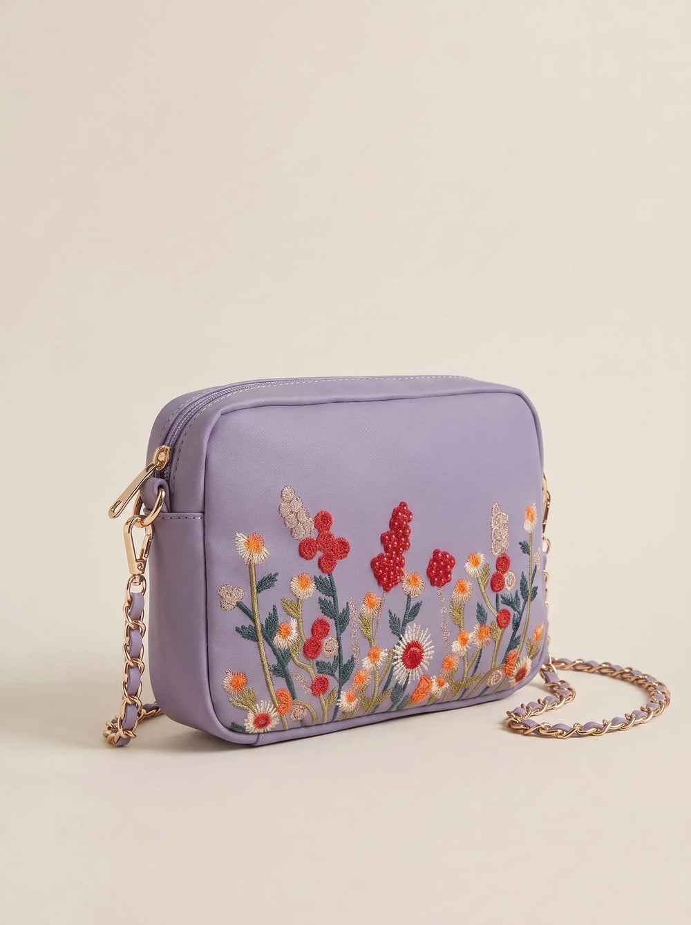 WestStyle Chic Crossbody lilac three-quarter view showing tonal lilac leather chain weave and smooth back panel crossbody bag for girls Pakistan