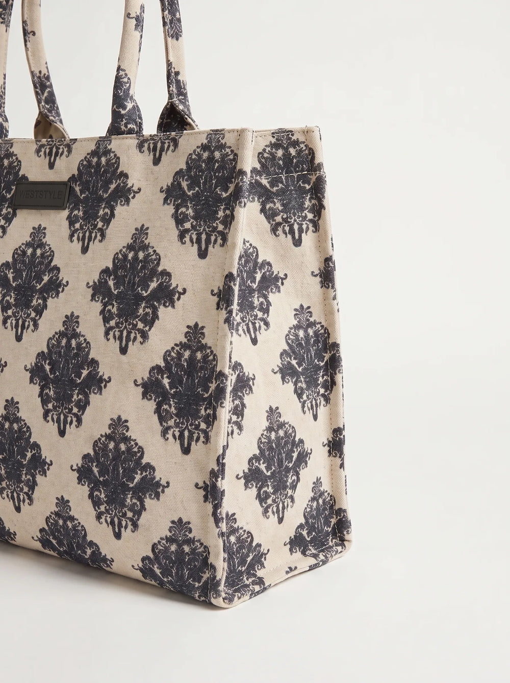 WestStyle damask beige canvas tote bag three-quarter view showing structured gussets and navy printed handles — canvas bags pakistan