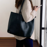 A women holding large Everyday tote bag  with spacious interior and pinteresty design - weststyle