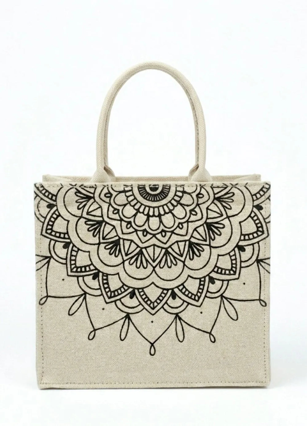 Beige women tote bag with black mandala design on a white background