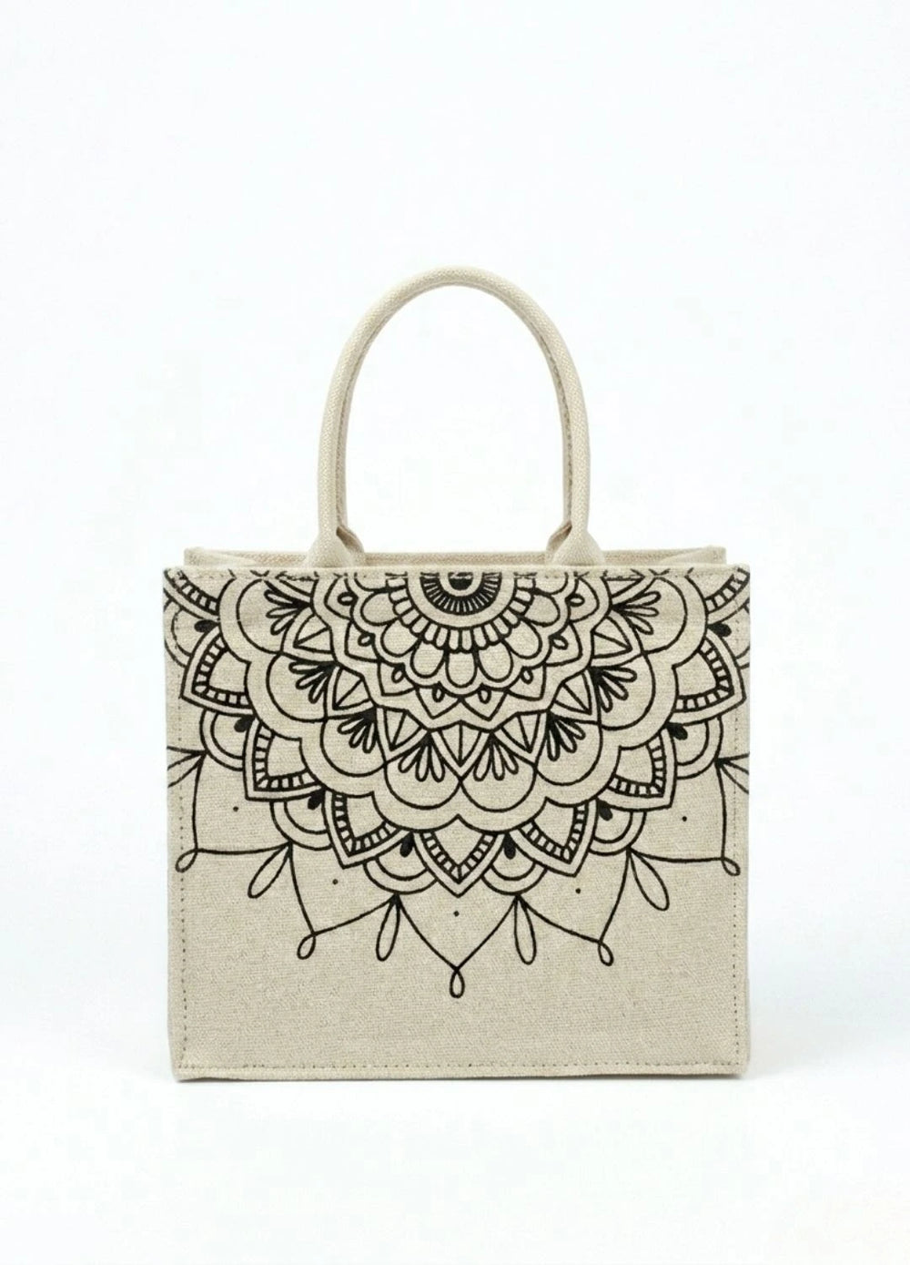 Women beige canvas tote bag against plain white background