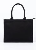 Women Black tote bag on a white background