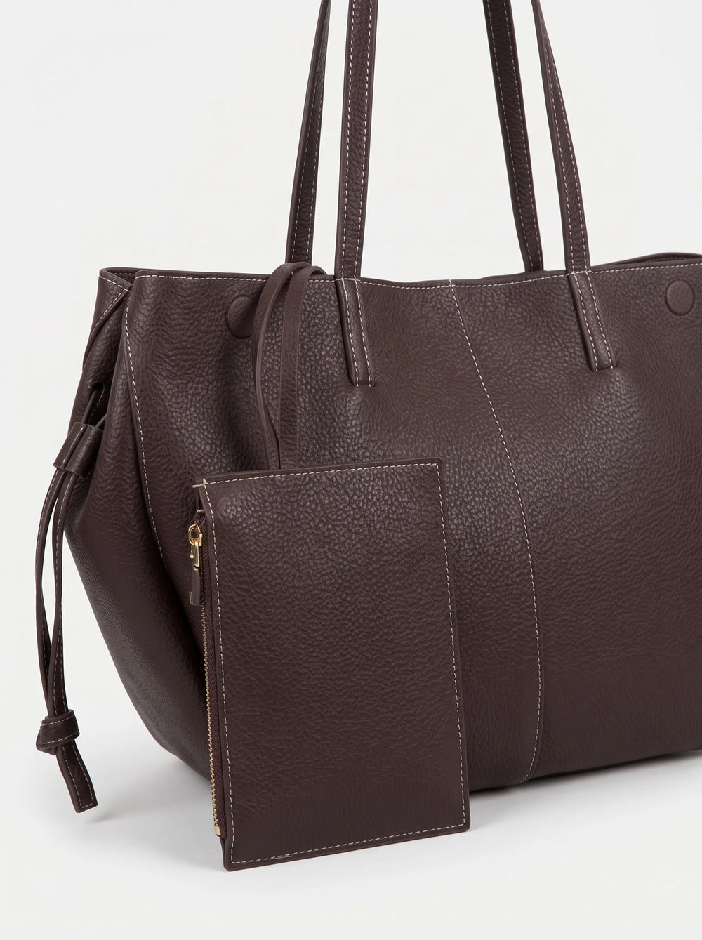 WestStyle dark brown pebbled leather drawstring tote bag three-quarter view showing side cinch ties and contrast stitching  women's tote bag Pakistan