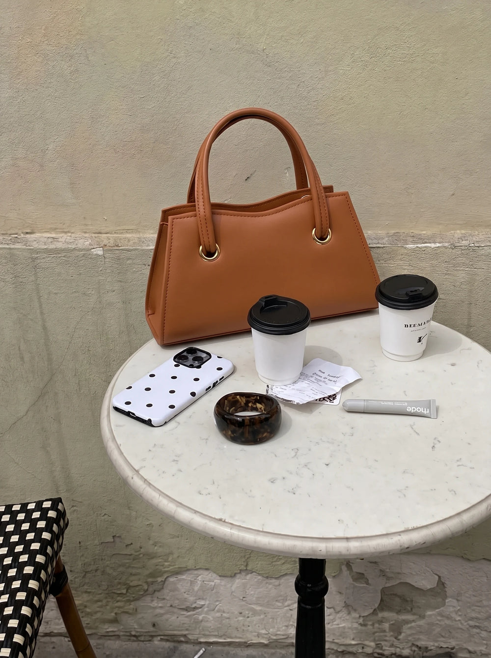 Baul Ring crossbody bag with detachable strap attached, styled as a trendy bag for girls by WestStyle Pakistan