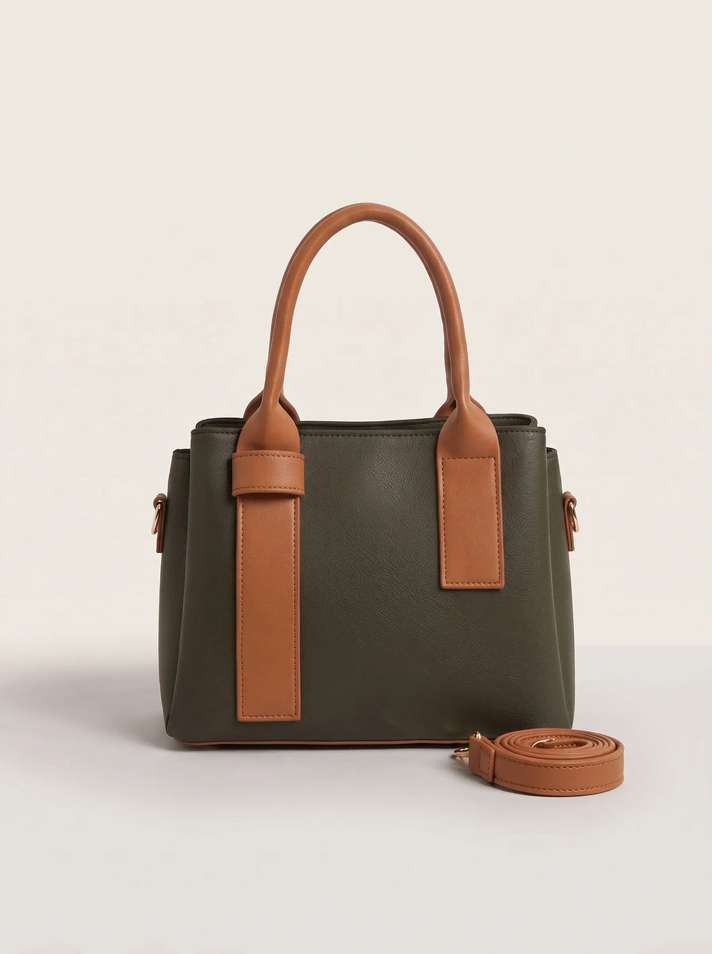 Flat tan detachable shoulder strap with gold clip beside WestStyle Roma dark bag crossbody shoulder bag for girls Pakistan