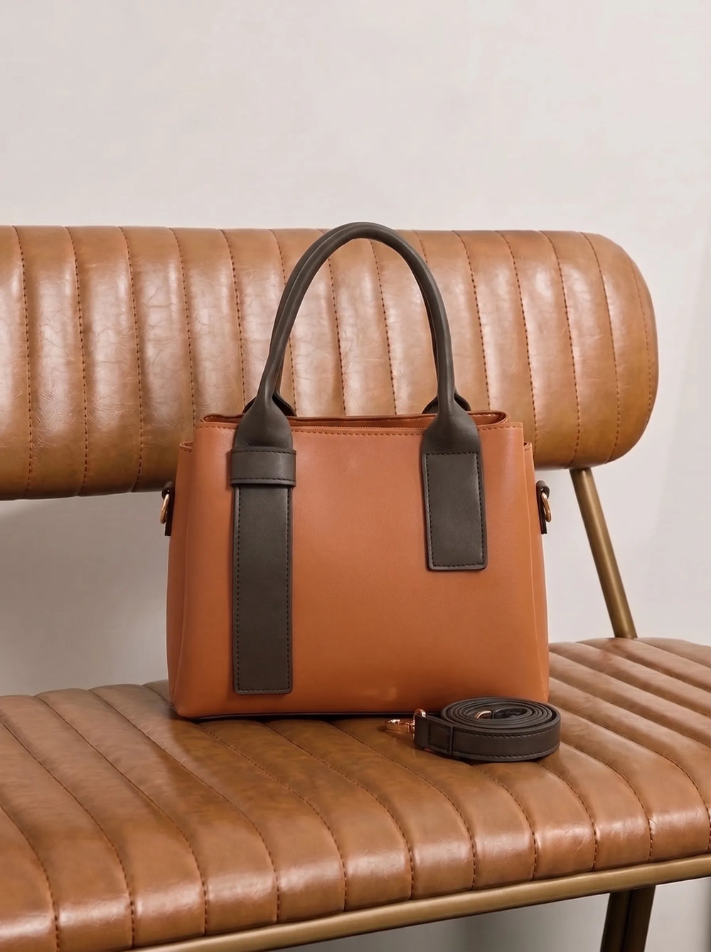 WestStyle Roma mustard shoulder bag with dark contrast panels and gold D-ring on leather chair classy shoulder bag for women Pakistan