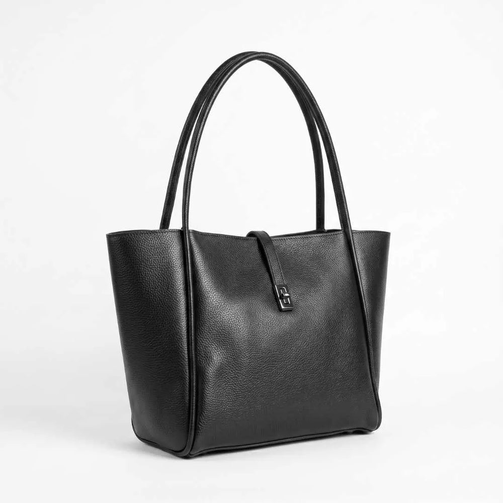 Rectangular turnlock closure and vertical strap tab detail on WestStyle Joblet black tote bag — structured office bag Pakistan