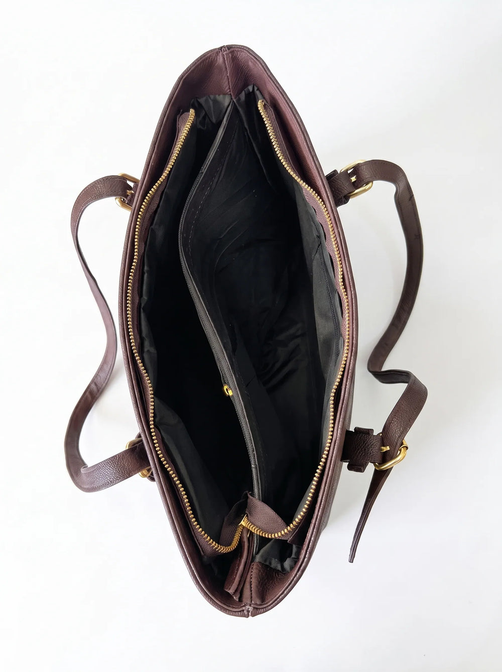 Interior of WestStyle brown checkerboard tote bag showing two zip compartments and inside pocket zipper tote bag for university women Pakistan