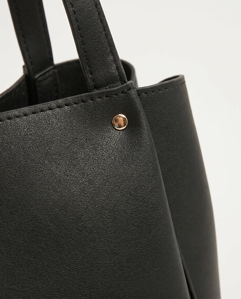 WestStyle large black smooth leather shoulder tote bag worn on shoulder office and university bag for women in Pakistan