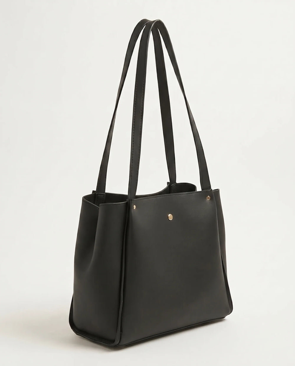 Single centred gold rivet on smooth matte black PU leather surface of WestStyle shoulder tote bag  stylish ladies bag Pakistan