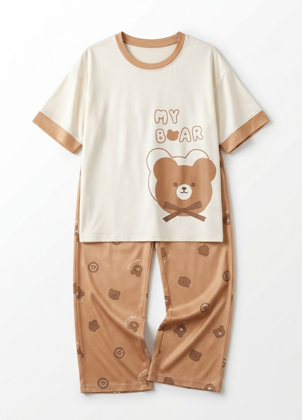 Children's pajama set with bear design on a white background
